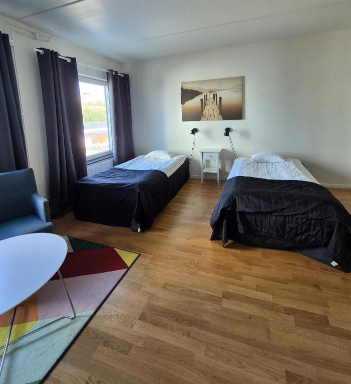 Postel nebo postele na pokoji v ubytování Hotel Torslanda