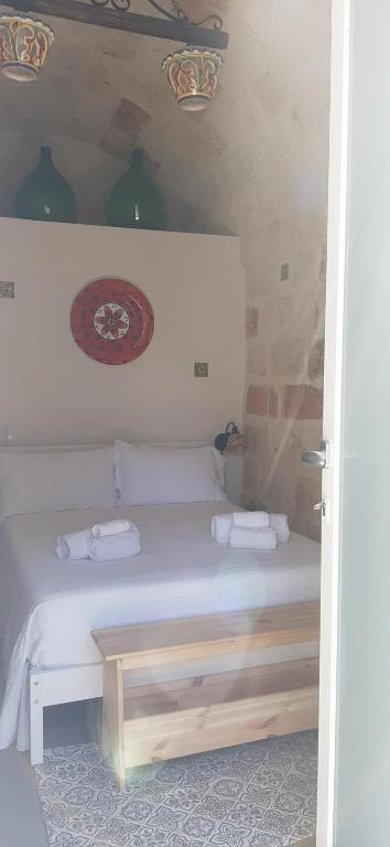 Postel nebo postele na pokoji v ubytování B&B Giada&Chiara