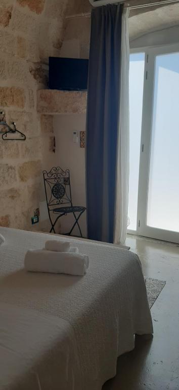 Postel nebo postele na pokoji v ubytování B&B Giada&Chiara