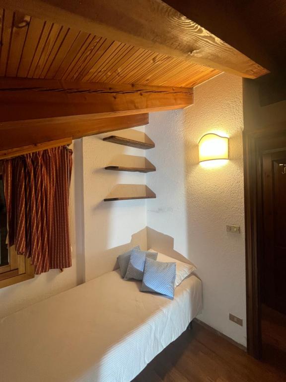 Postel nebo postele na pokoji v ubytování Chalet Blanc Le Duplex
