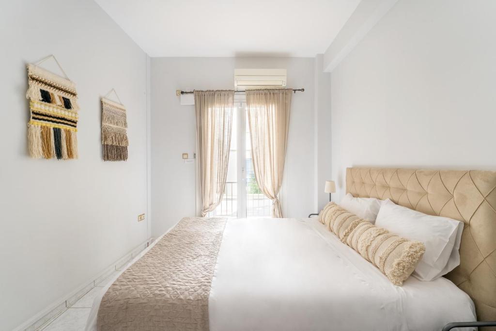 Posteľ alebo postele v izbe v ubytovaní Acropolis Boho Bliss