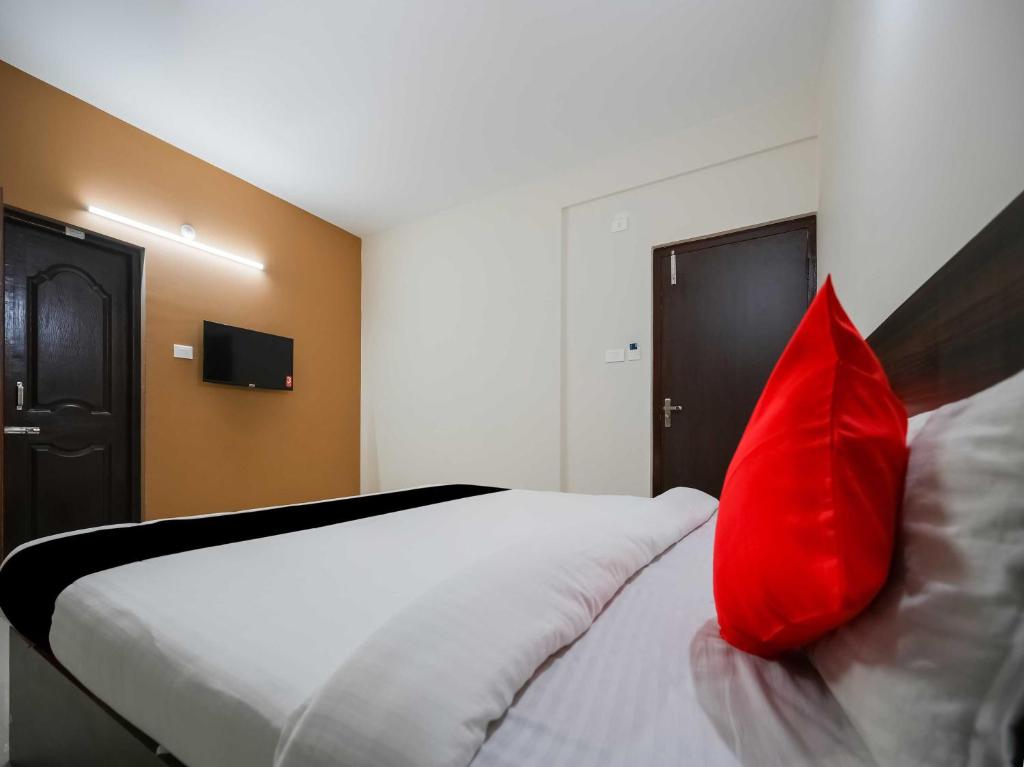 Postel nebo postele na pokoji v ubytování Super Namaskar Diamond Key