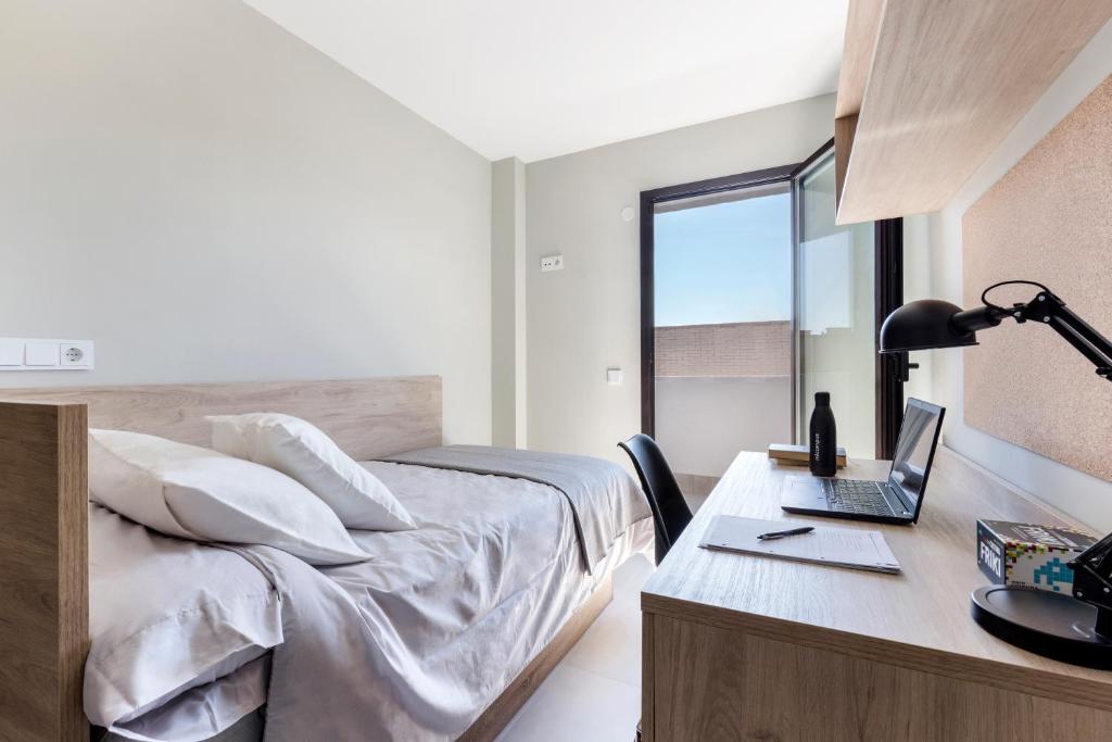 Postel nebo postele na pokoji v ubytování Micampus Cartagena Student Residence
