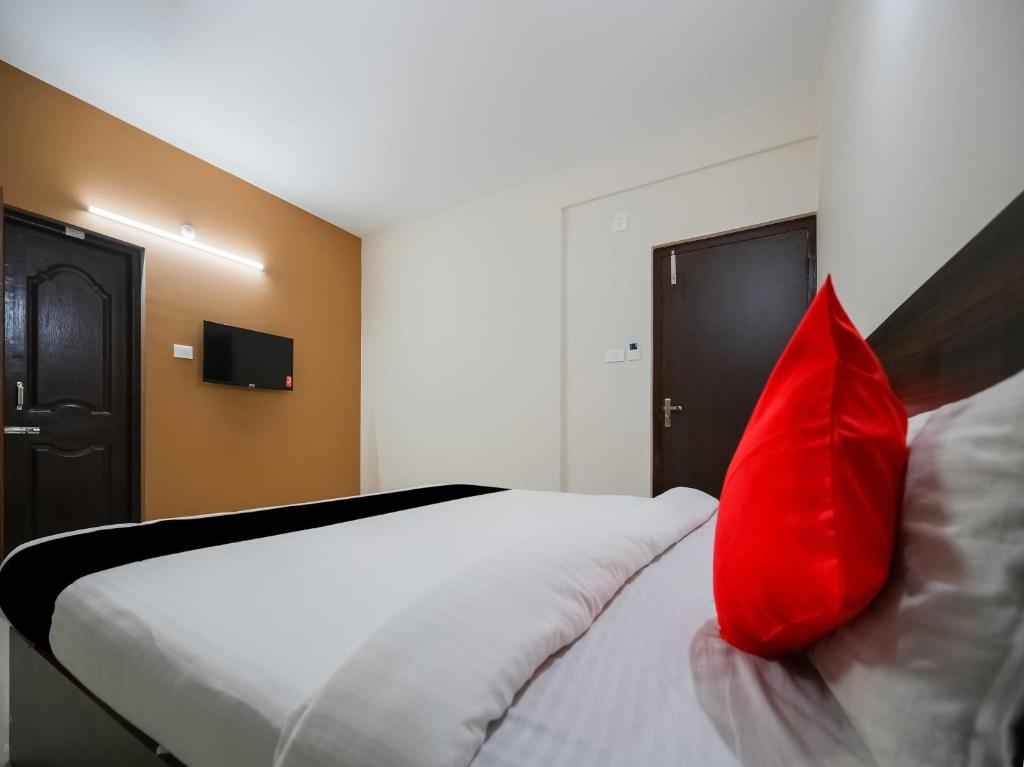 Postel nebo postele na pokoji v ubytování Super Namaskar Diamond Key