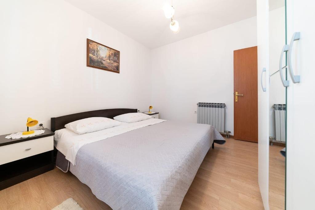 Łóżko lub łóżka w pokoju w obiekcie House Villa Petar 1
