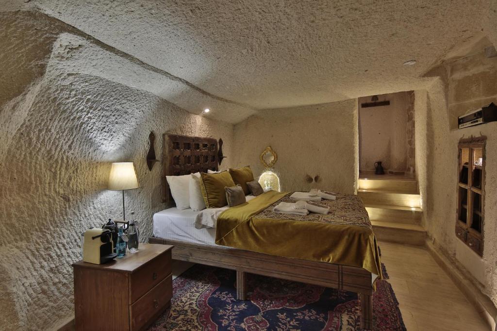 Postel nebo postele na pokoji v ubytování Rox Cappadocia
