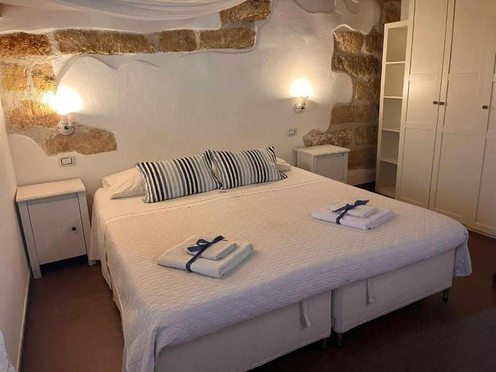 Postel nebo postele na pokoji v ubytování Rustico San Leonardo