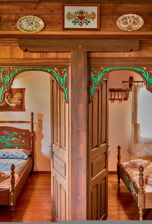 A bed or beds in a room at Archontiko Merylins Pinakates Pelion