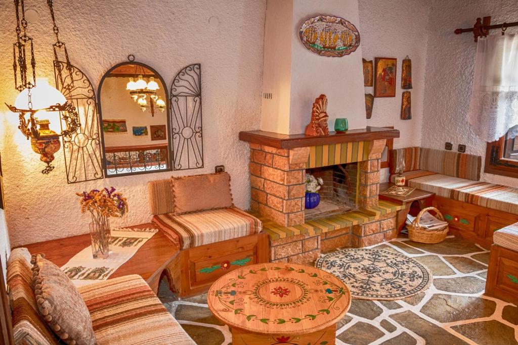 A seating area at Archontiko Merylins Pinakates Pelion