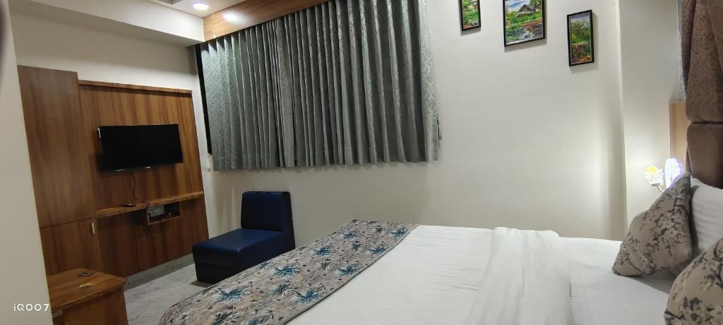 Postel nebo postele na pokoji v ubytování Hotel Primeland Villa Gota