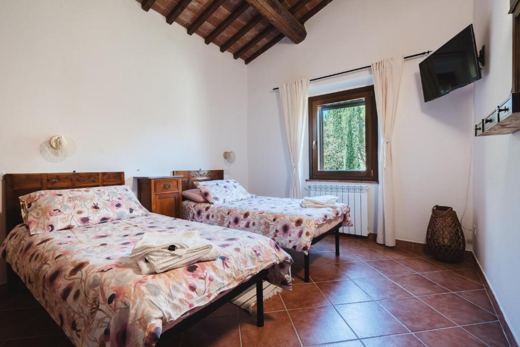 Postel nebo postele na pokoji v ubytování Villa San Giusto - Pool&Relax
