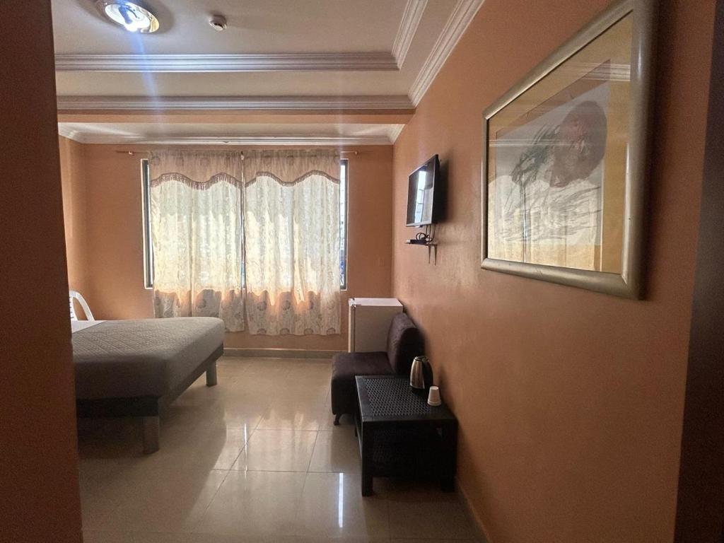 TV a/nebo společenská místnost v ubytování Hotel Caribe