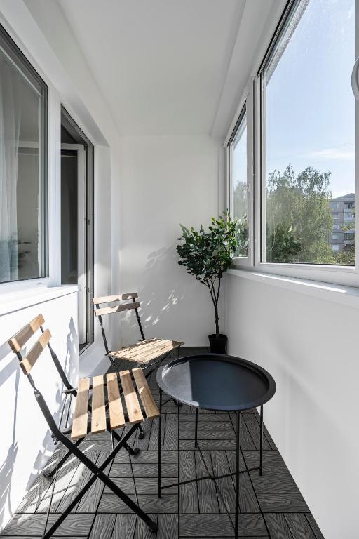 Balkón nebo terasa v ubytování GoldenHugo rooms
