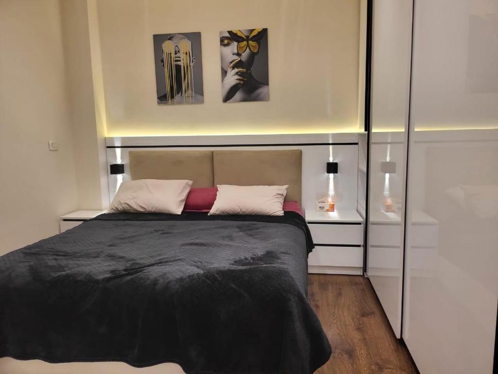 Postel nebo postele na pokoji v ubytování Madinity B8 - Fantasy Studio