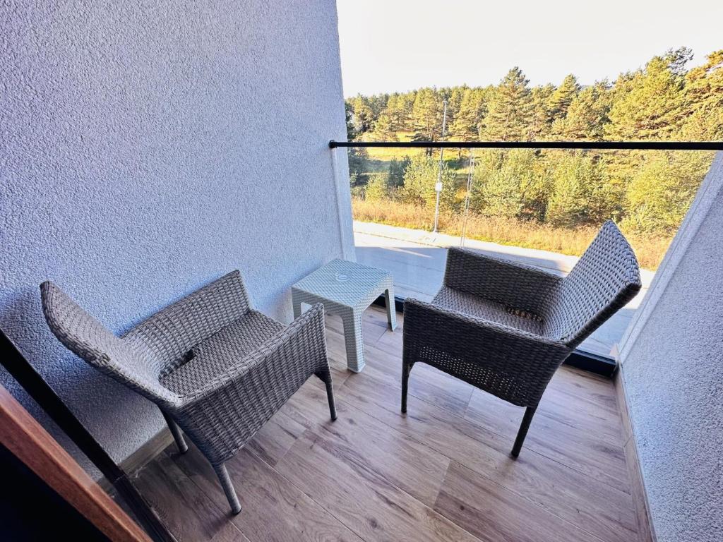 Posezení v ubytování Indigo Royale apartman Borovi
