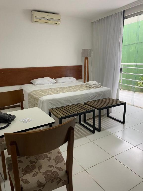 Postel nebo postele na pokoji v ubytování Valparaiso Hotel