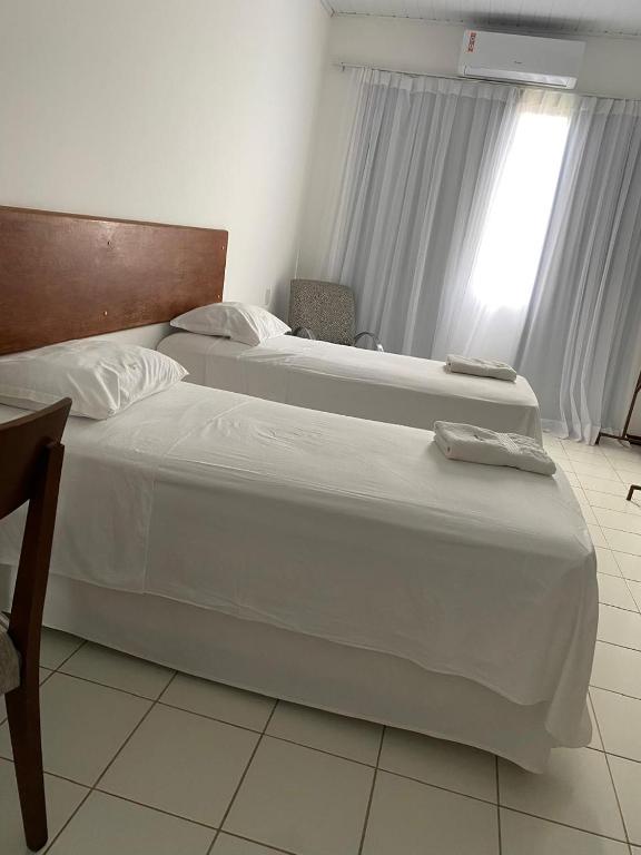 Postel nebo postele na pokoji v ubytování Valparaiso Hotel