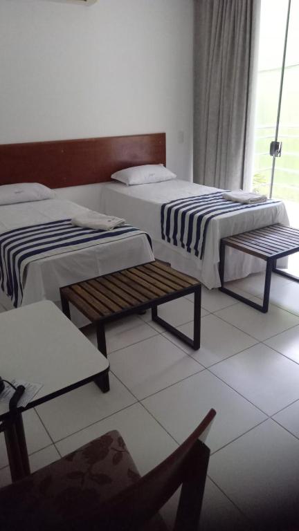 Postel nebo postele na pokoji v ubytování Valparaiso Hotel