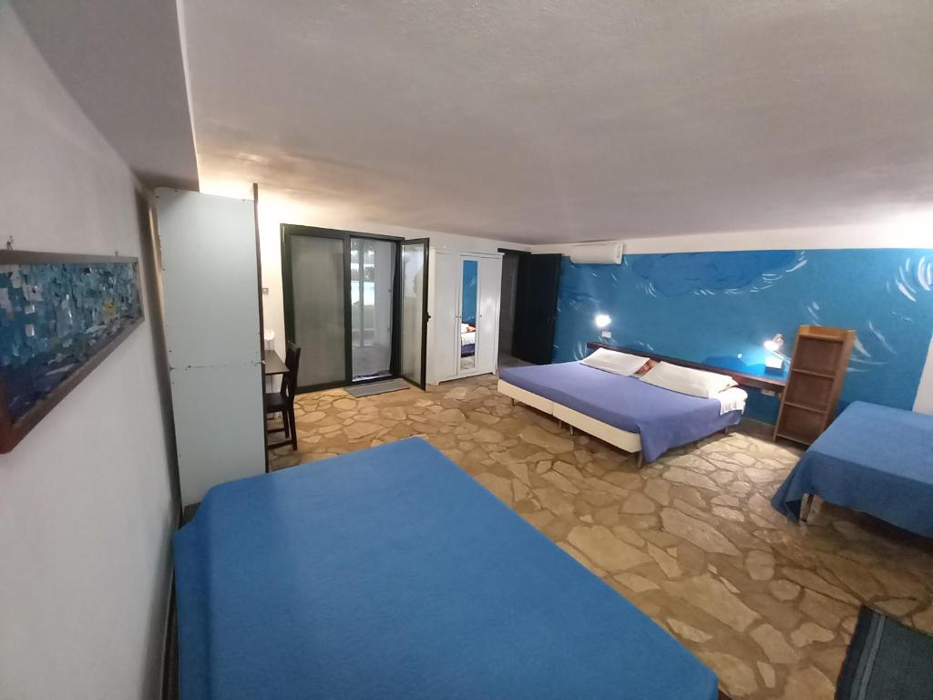 Postel nebo postele na pokoji v ubytování Breezes B&B