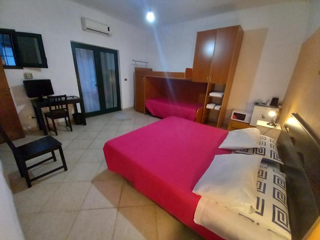 Postel nebo postele na pokoji v ubytování Breezes B&B