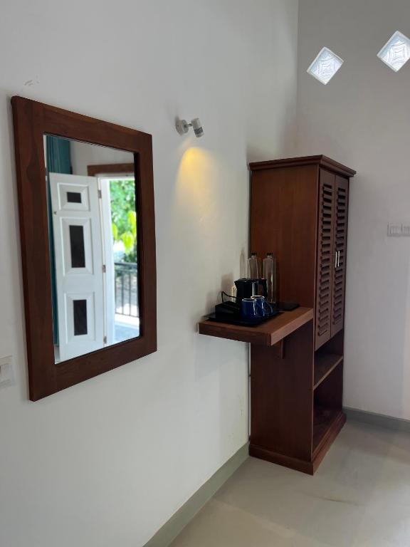 Kuchyň nebo kuchyňský kout v ubytování TEMBO Cottage Wilpattu