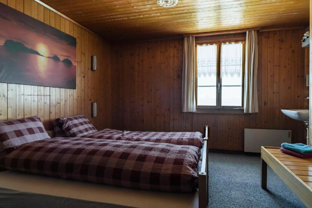 Postel nebo postele na pokoji v ubytování Berggasthaus Rigi-Burggeist