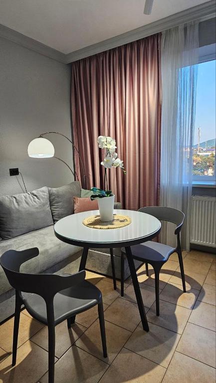 Posezení v ubytování Blue Apartment
