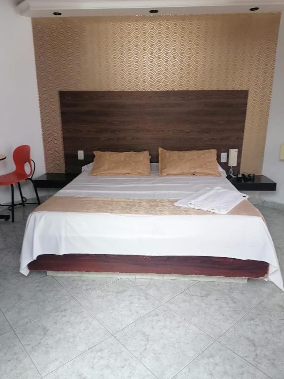Postel nebo postele na pokoji v ubytování Apartahotel la Posada Suite