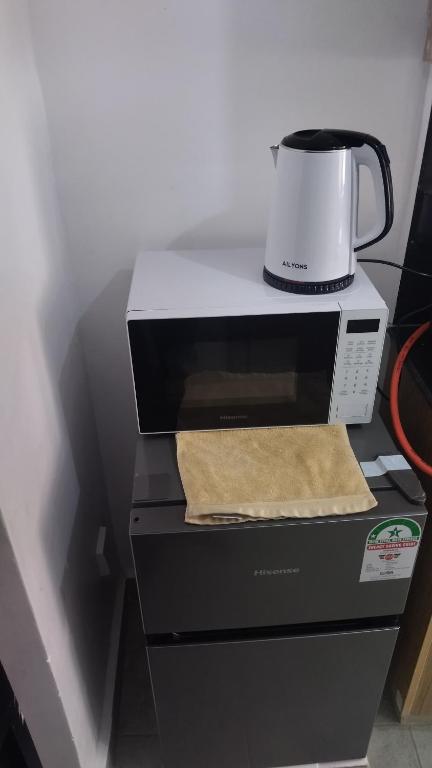 Kuchyň nebo kuchyňský kout v ubytování Tsavo Studio Fedha