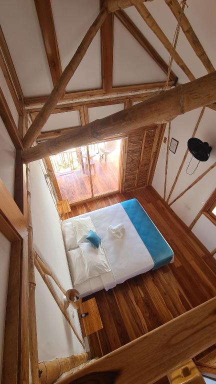 Postel nebo postele na pokoji v ubytování Intiquilla Hotel