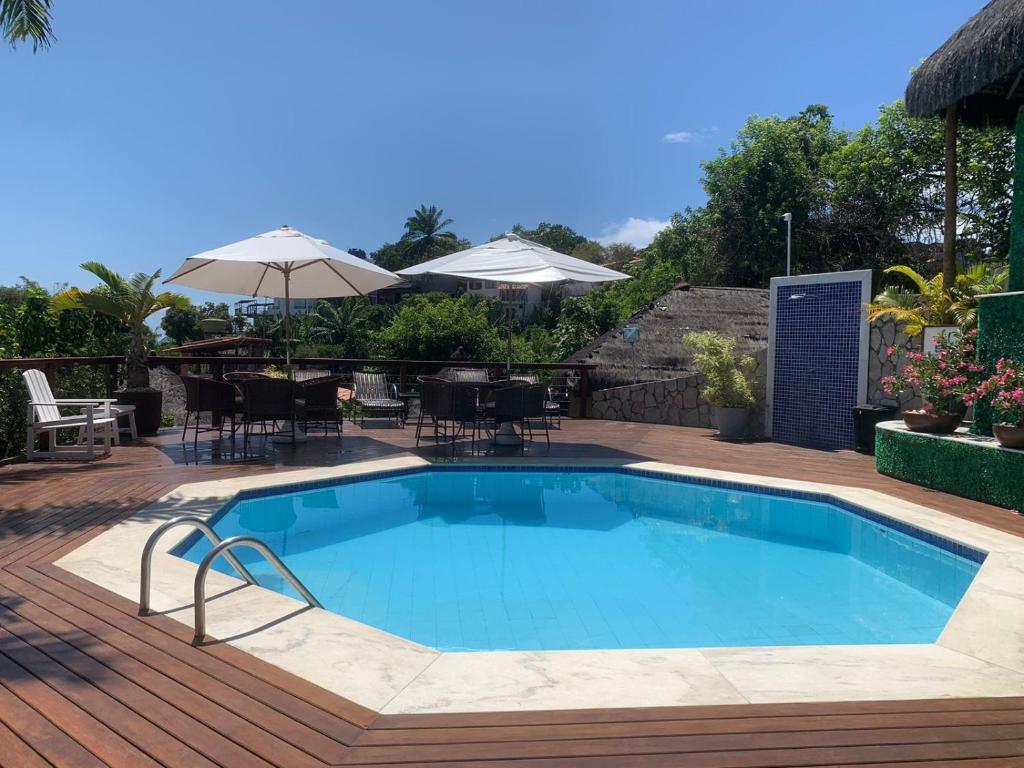 Bazén v ubytování Hotel Morro De São Paulo nebo v jeho okolí