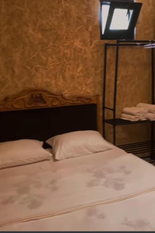 Postel nebo postele na pokoji v ubytování Тнак