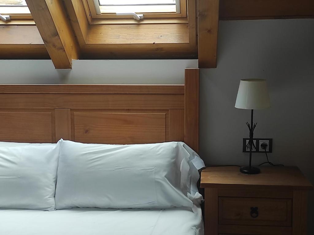 Postel nebo postele na pokoji v ubytování Casa Bielsa