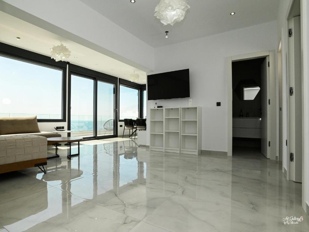 TV a/nebo společenská místnost v ubytování Panorama Penthouse