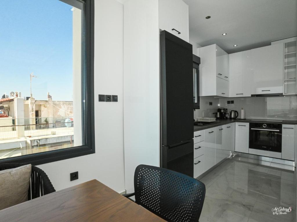 Kuchyň nebo kuchyňský kout v ubytování Panorama Penthouse