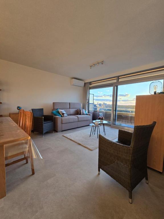 Posezení v ubytování Cosy apartment with sea view Residentie Astrid