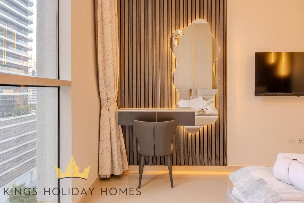 TV a/nebo společenská místnost v ubytování Royal suites Dunya tower Burj Khalifa St Kings