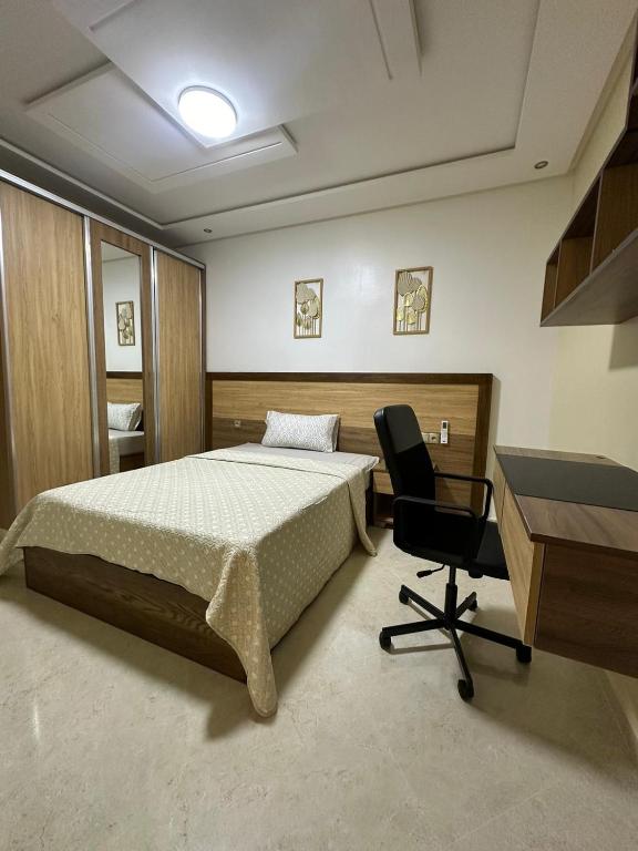 Postel nebo postele na pokoji v ubytování appartement à fes