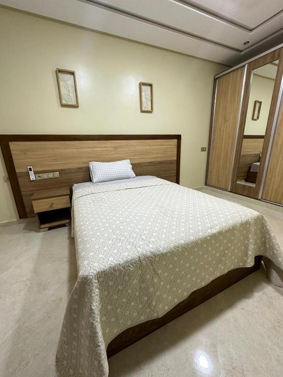 Postel nebo postele na pokoji v ubytování appartement à fes