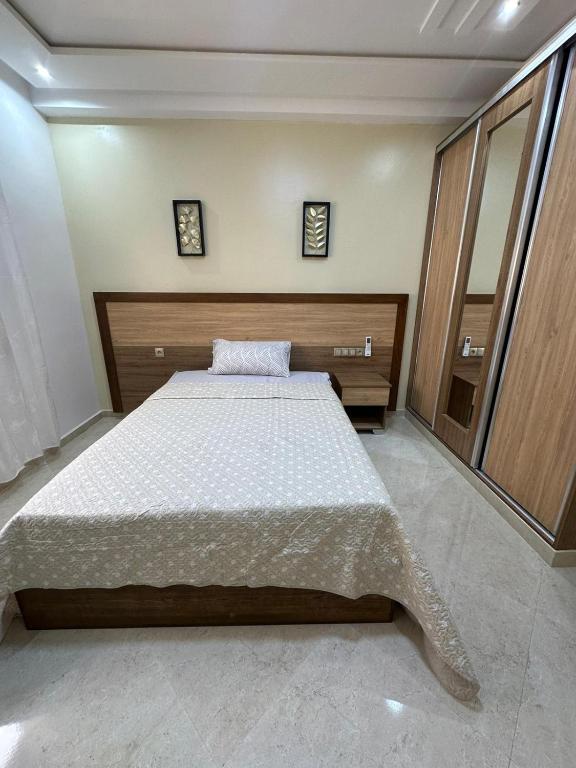 Postel nebo postele na pokoji v ubytování appartement à fes