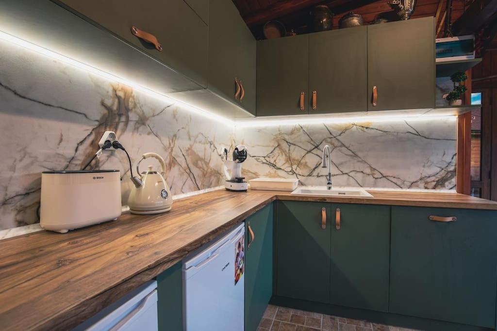 Kuchyň nebo kuchyňský kout v ubytování Duvaro Guesthouse