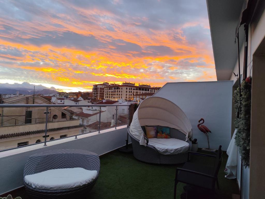 A seating area at ÁTICO RILQUE, Apartamentos Independientes con Jacuzzi Privado y Terraza en Ronda