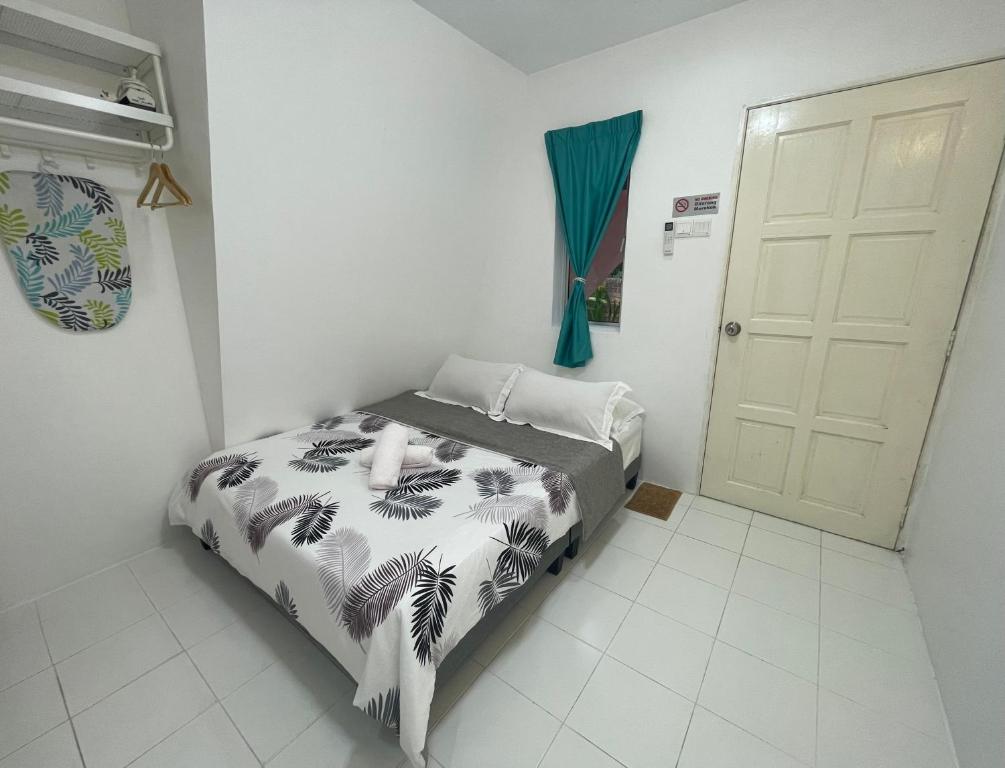 Postel nebo postele na pokoji v ubytování WIWI Village