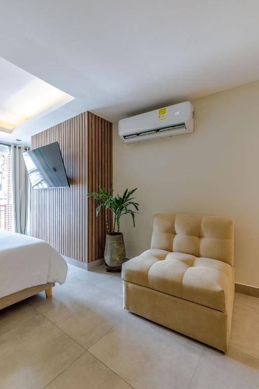 Postel nebo postele na pokoji v ubytování De la cruz Studio Apartments