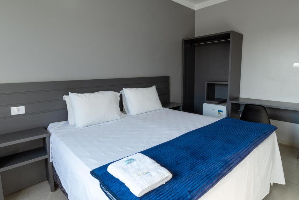 Postel nebo postele na pokoji v ubytování Euro Hotel