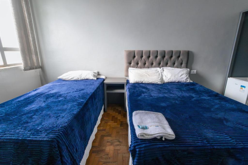 Postel nebo postele na pokoji v ubytování Euro Hotel