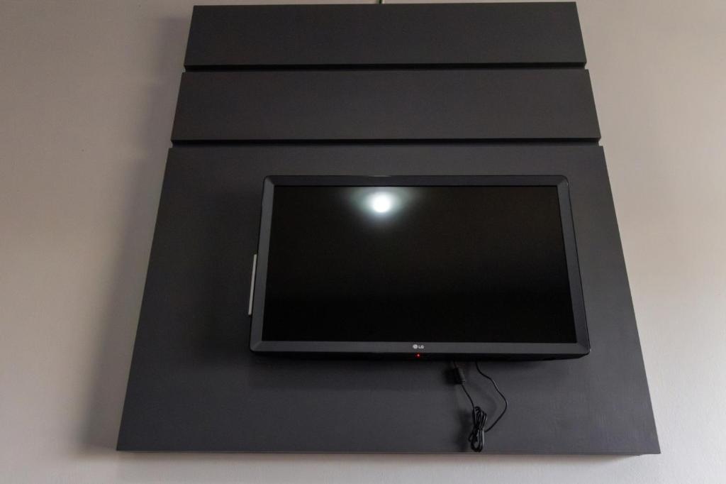TV a/nebo společenská místnost v ubytování Euro Hotel