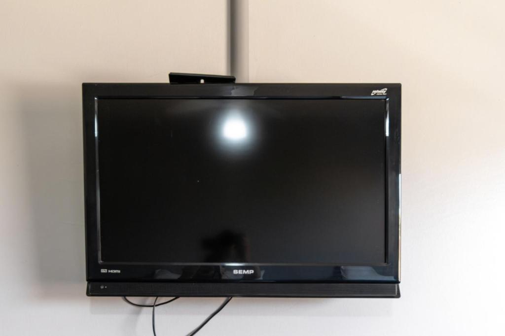 TV a/nebo společenská místnost v ubytování Euro Hotel