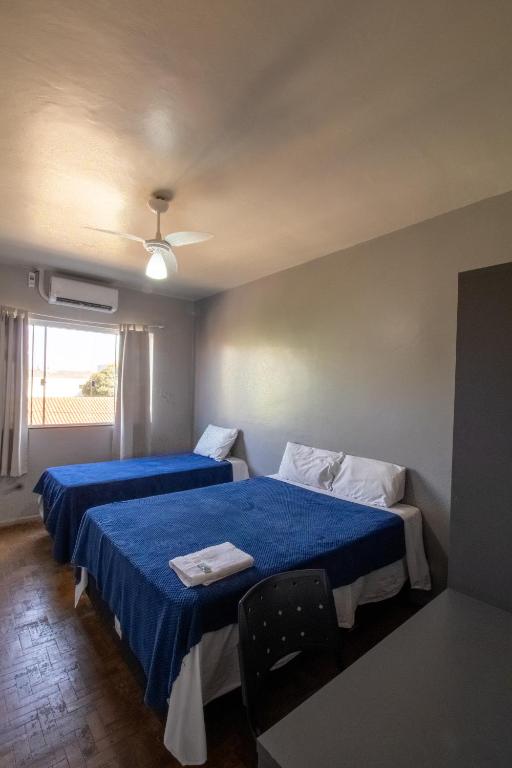Postel nebo postele na pokoji v ubytování Euro Hotel