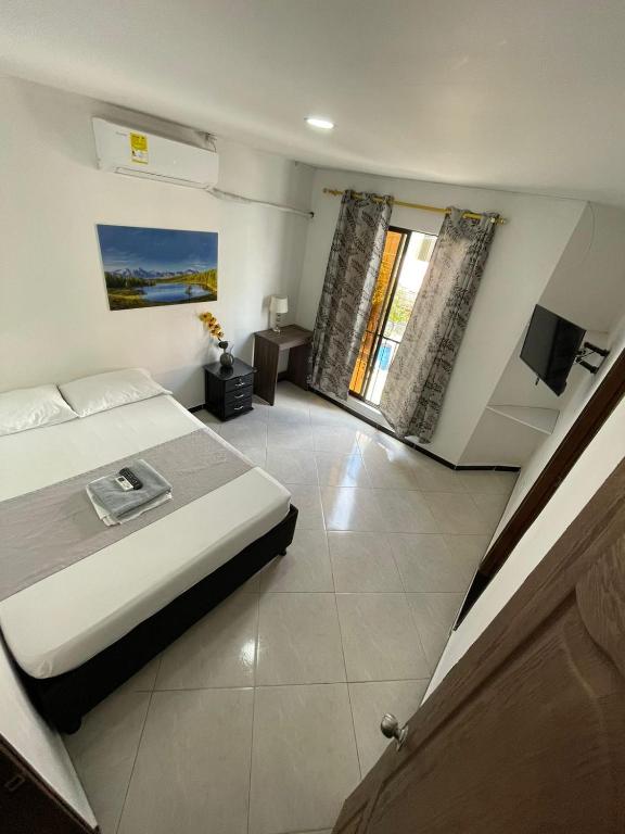 Postel nebo postele na pokoji v ubytování Hotel SG